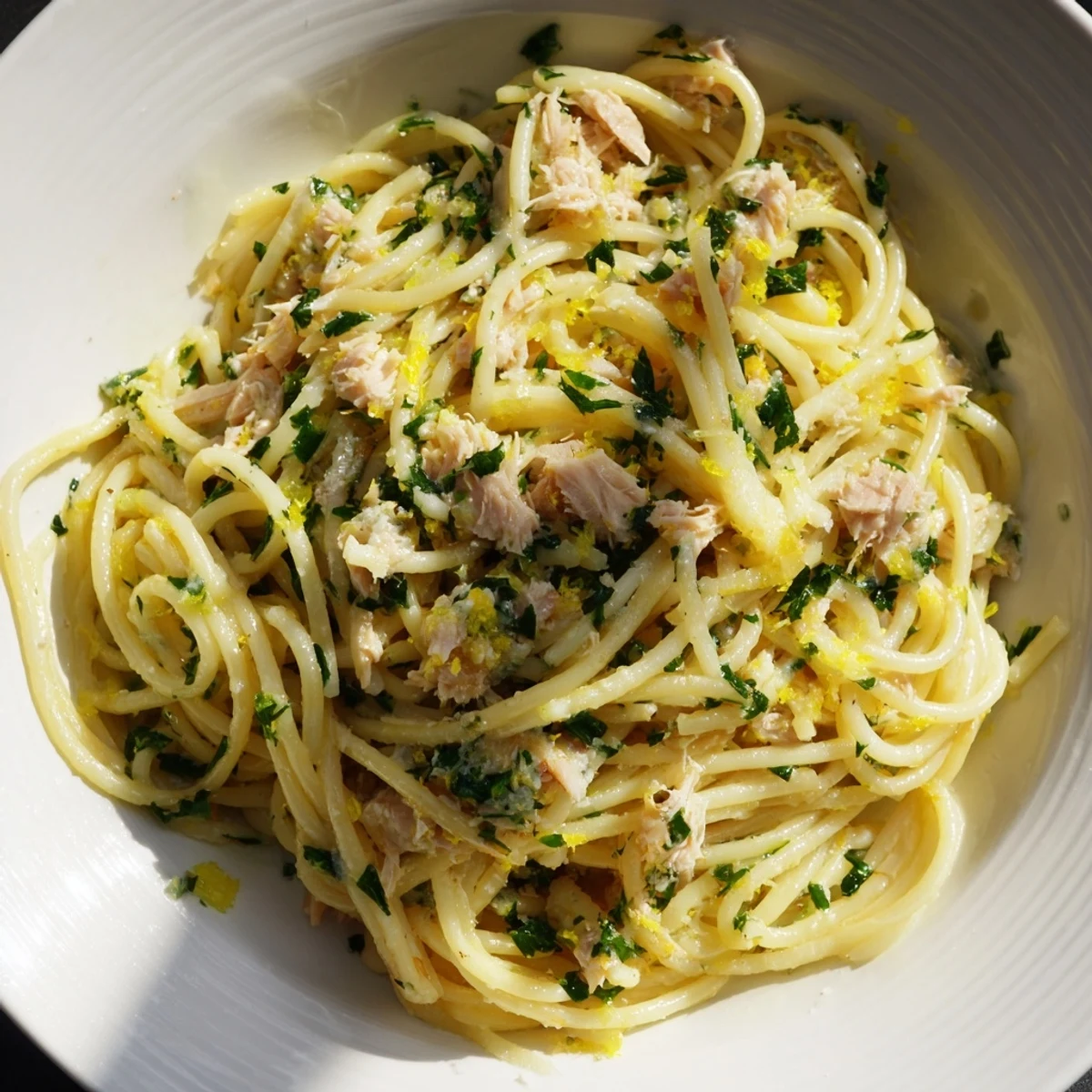 Golden-yellow Lemon-Garlic Tuna Spaghetti, a bright and flavorful Italian pasta dinner.