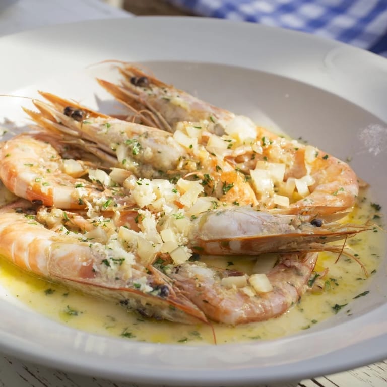 Picture the perfect bite: creamy garlic shrimp, a luscious 20-minute recipe with fresh parsley garnish.