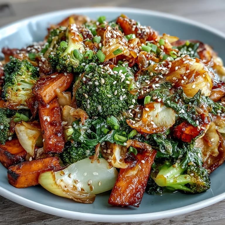 Hearty winter vegetables in this Comforting Fermented Veggie Winter Stir-Fry are sautéed with ginger and garlic, then topped with crunchy sesame seeds.